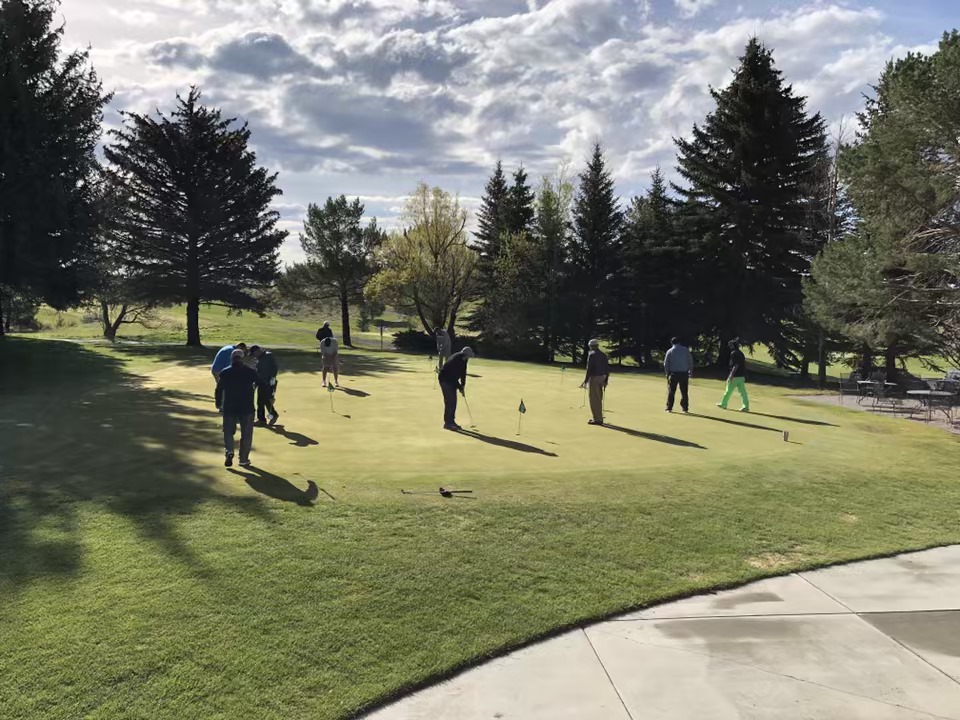 View of golfers on golf course 